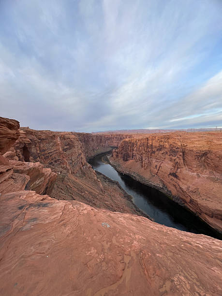 The breathtakingly beautiful Horseshoe Bend at sunset in Arizona, USA, is truly captivating stock photo
