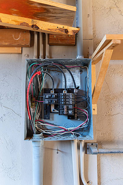 old electrical sub panel in a residential garage