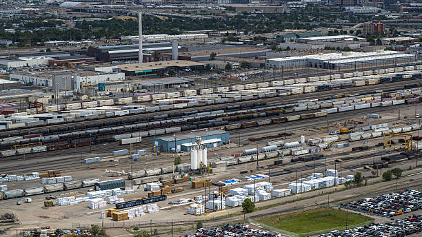 istock Intermodal rail yard operations with cargo containers and freight cars. Extensive transportation hub in Denver, Colorado serving national supply chain network. 2236197126