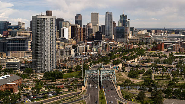 istock Five Points district connects to commercial center via bridge at Speer Blvd. High-rise buildings frame Denver, Colorado skyline. 2236197350