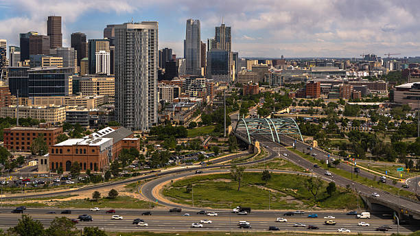 istock Modern bridge connects Five Points to downtown Denver skyline. Highway traffic flows beneath architectural landmark in Colorado. 2236197378