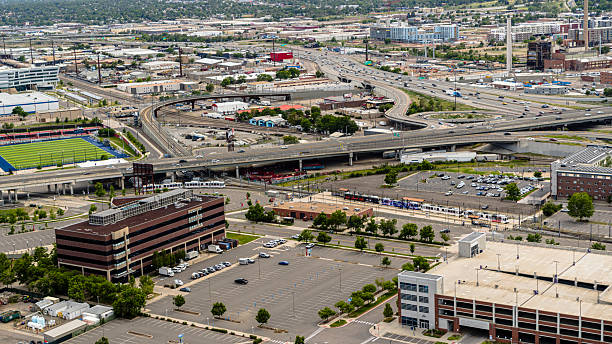 istock Transportation hub with light rail station and highway interchange in Lincoln Park, Denver. Urban infrastructure supporting daily commute and public transit. 2236197734