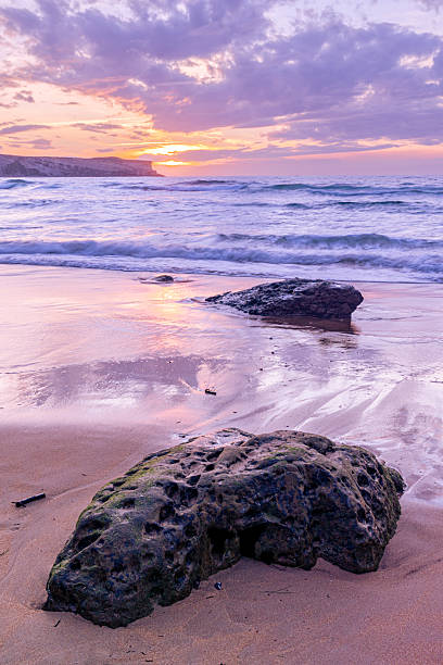 istock Vertical take of the sunset at the beach 2236200025