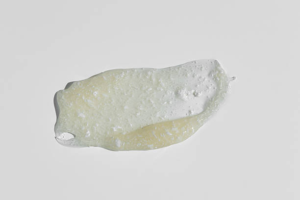istock Scrub stroke isolated on white background. White exfoliation cream smear smudge sample. Peeling scrubbing face or body skincare product swatch. showcase of the product 2236202192