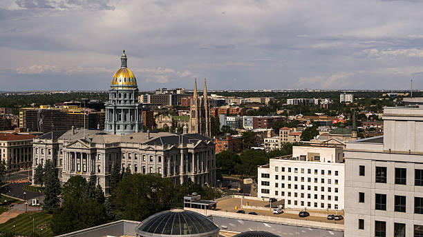 istock Downtown skyline view with State Capitol and Cathedral Basilica of the Immaculate Conception in Capitol Hill. Neoclassical architecture dominates Denver, Colorado cityscape. 2236204599