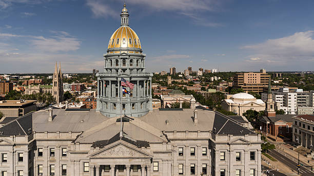 istock Colorado State Capitol building with gold dome in downtown Denver. Neoclassical architecture landmark against city skyline. 2236205549
