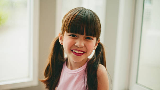 istock Little girl happy and smiling face. 2236209562