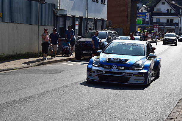 Adenau, Germany - June 06/18/2025: Adenau Race Day with race cars on the city streets, VW Golf TCR