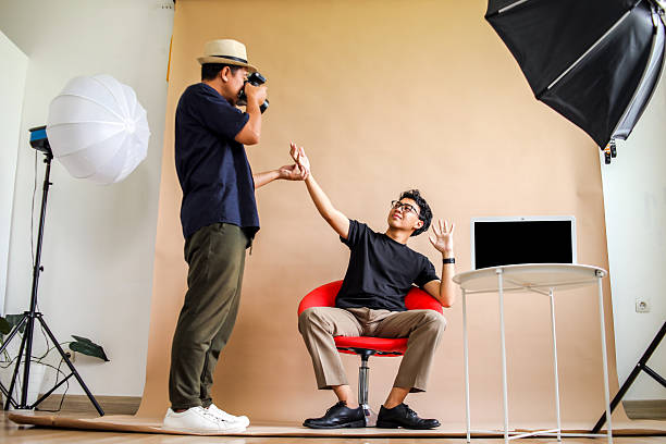 istock Photographer Captures Playful Moment As Model Reacts Dramatically In Studio 2236217399