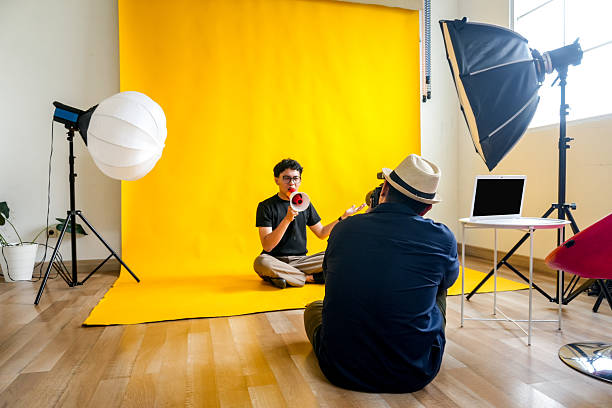 istock Photographer Captures Creative Portrait Of A Man Using A Megaphone As A Prop 2236217790