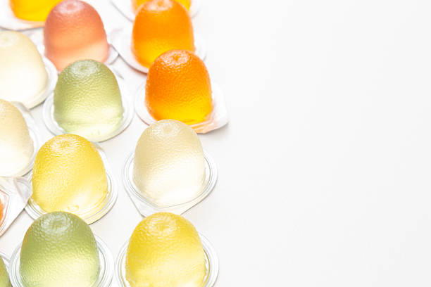 Colorful cup jelly on white background.