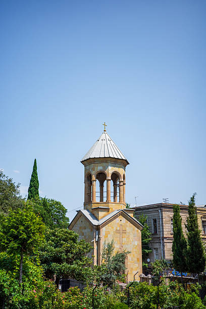 istock Charming Small Orthodox Church with Bell Tower and Garden 2236222380
