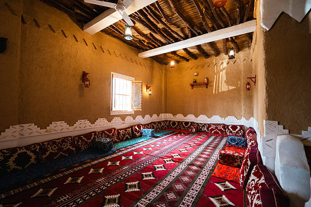istock Interior Setting of Arabian Room with Red Carpet and Beamed Ceiling 2236225531
