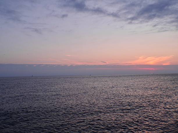 istock Lake Michigan at dusk with blue sky. 2236227626