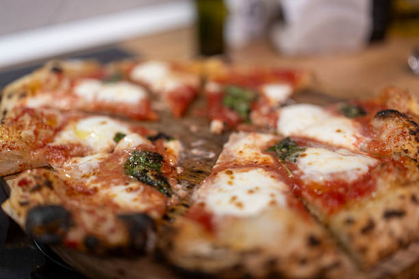 istock Delicious Neapolitan Pizza with Fresh Mozzarella and Basil Toppings on a Crispy Crust 2236231949