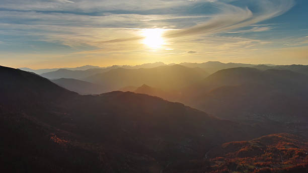 istock Flying over colorful foliage at sunset in mountains 2236233664