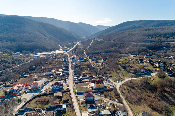 istock A mountain range with a small town in the valley 2236234688