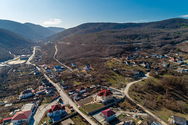 istock A mountain range with a small town in the valley 2236234917