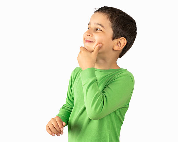 istock Happy child in green t-shirt over white background 2236240077