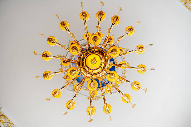 istock A large chandelier with many gold and blue lights hanging from it 2236241331