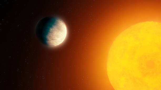 istock An extrasolar planet orbiting a star. A tidally locked planet in space. 2236241335
