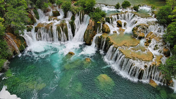 istock Krka Waterfalls with turquoise water 2236243631