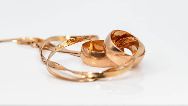 istock Gold Wedding Rings With Braided Bracelet 2236243670