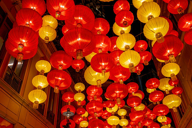 istock Colorful chinese lanterns illuminate evening street 2236245051