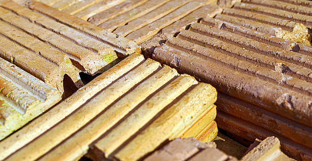 istock Pile of bricks for construction work, brown brick background, Close-up of stacked bricks ready to be used as a construction material. 2236247838