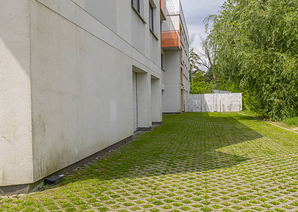 istock Outdoor side view of modern apartment building with green grass pattern pavement 2236253554