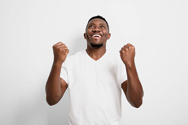 istock Black men wearing white shirt in studio shot on white background 2236257754