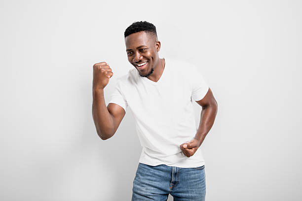 istock Black men wearing white shirt in studio shot on white background 2236257967