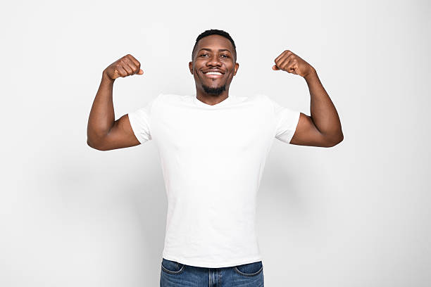 istock Black men wearing white shirt in studio shot on white background 2236258156