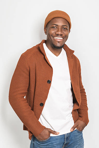 istock black man confident and casual on white background wearing hat 2236258851
