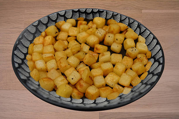 istock Cube-shaped French fries with vegetable topping 2236260843