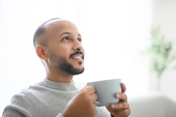 istock young islamic arab drink coffee on sofa at home 2236267104