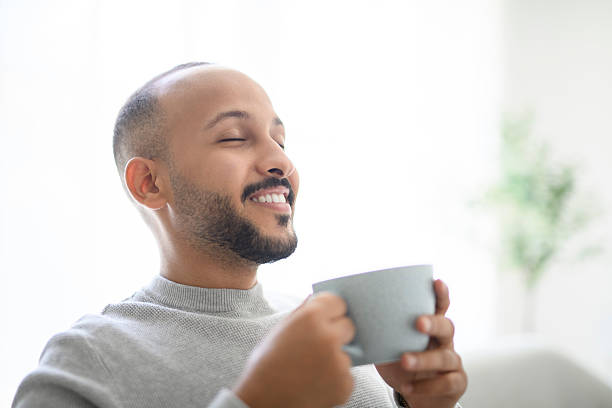 istock young islamic arab drink coffee on sofa at home 2236267119