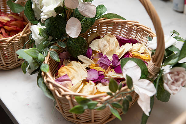 dried pink  Rose arranged in a wicker basket