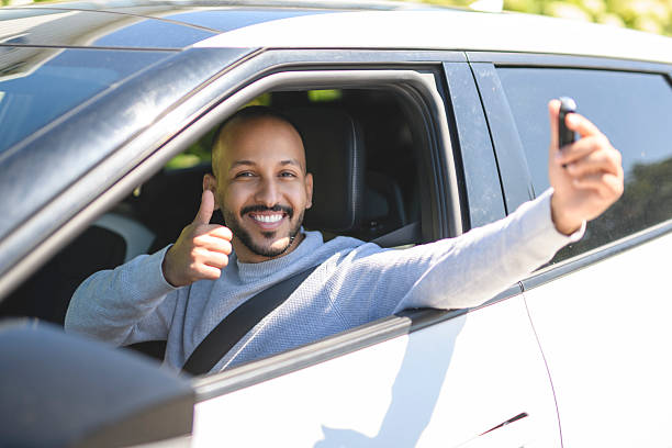 istock young islamic arab man with his new car 2236268109