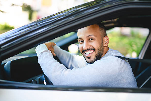 istock young islamic arab man with his new car 2236268135
