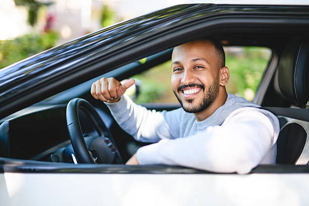 istock young islamic arab man with his new car 2236268137