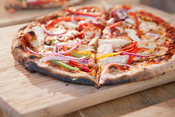 Pizza cooked in a wood-fired oven