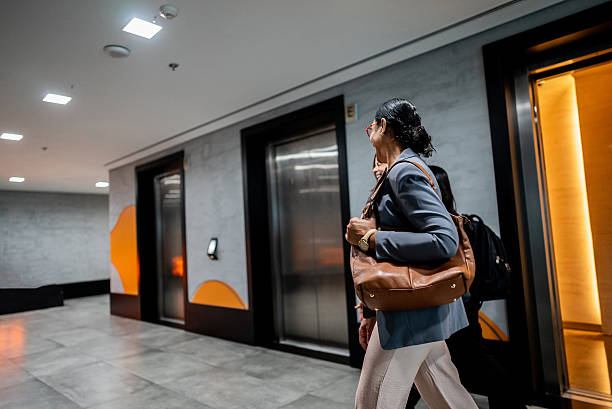istock Businesswomen walking and talking on the office 2236269656