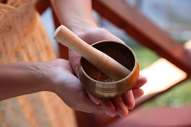istock Woman with singing bowl outdoors, closeup view 2236278869