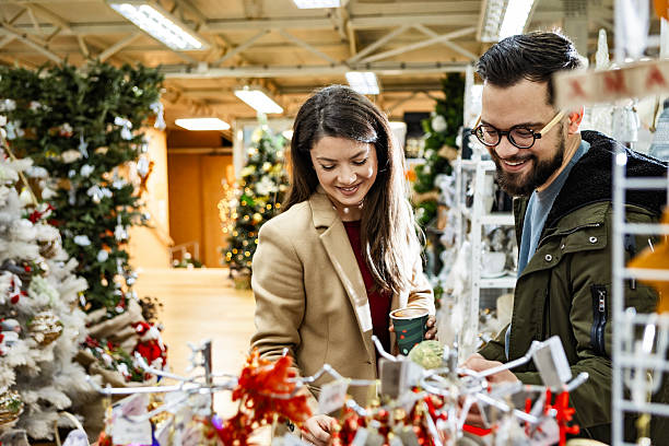 istock Cheerful pair strolling during holiday shopping 2236280476