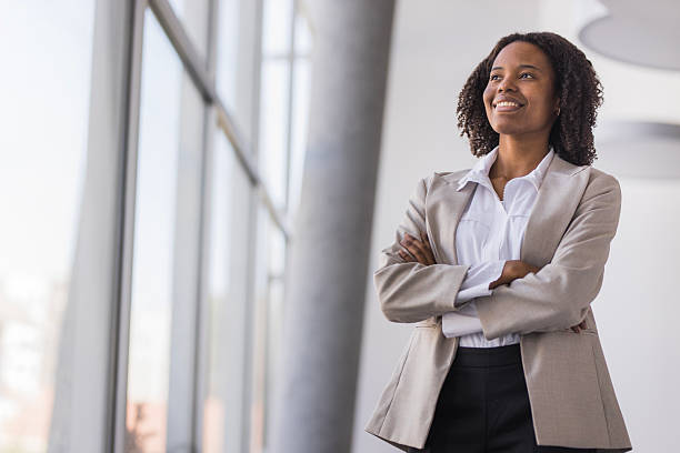 istock Confident black businesswoman standing in modern office 2236282488