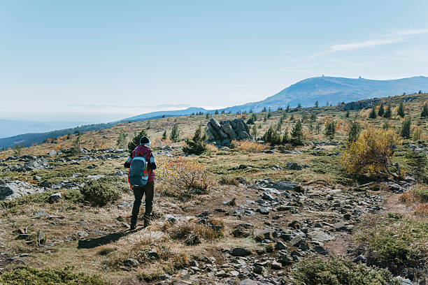 istock Senior man hiking in the autumn mountain 2236287595