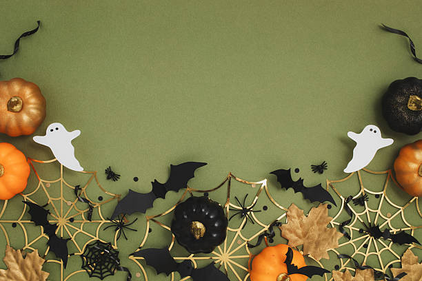 istock Happy halloween background with party decorations from pumpkins, bats, spiderweb, ghosts top view. Mystic autumn holiday greeting card concept. 2236288143