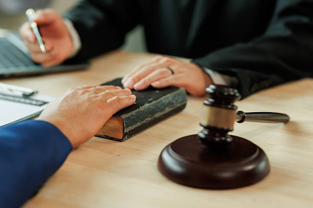 istock A lawyer and a client collaborate to ensure fairness. 2236288356