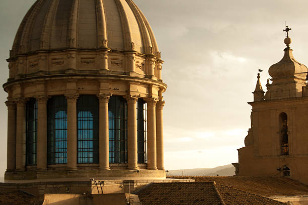 Ragusa Ibla, Sicily: The baroqueSan Giorgio Cathedral lit up by a setting sun. Ragusa Ibla is a UNESCO World Heritage Site in the Val di Noto.